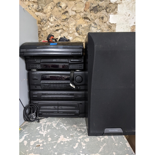 467 - A Kenwood stereo stacking system with speakers to include a P-28 turntable, a DP-28 CD player and a ... 