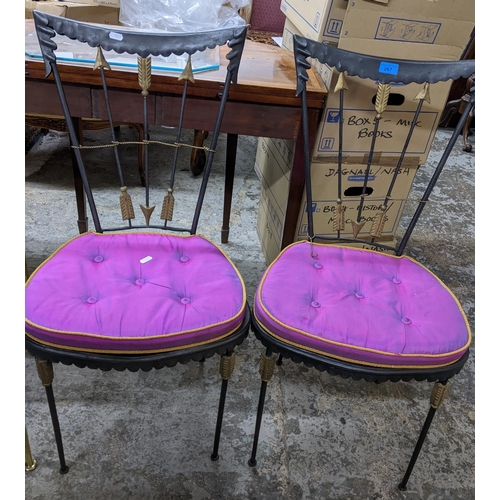 470 - A pair of contemporary French metal arrow back side chairs with loose cushion seats
Location: G