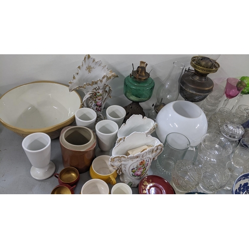 360 - A mixed lot to include Victorian oil lamps, Tiffany Portuguese cup and saucer, hock glass and other ... 