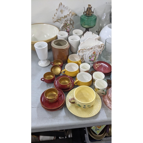 360 - A mixed lot to include Victorian oil lamps, Tiffany Portuguese cup and saucer, hock glass and other ... 