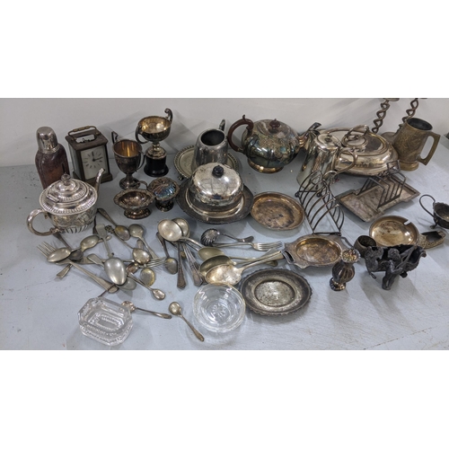 374 - A mixed lot of mainly silver plate to include a toast rack, candlesticks, teapot and other mixed sil... 