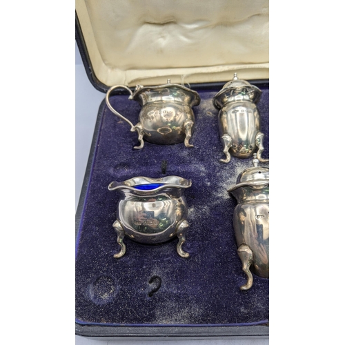 428 - A six piece condiments hallmarked Birmingham 1918, total weight excluding glass 226g, box A/F
Locati... 