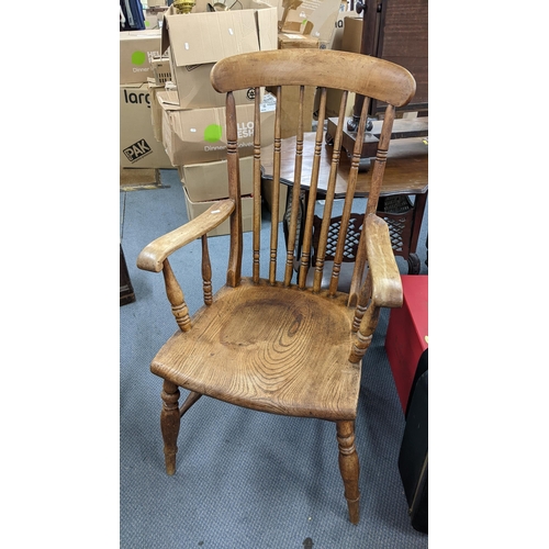 455 - A late 19th century Windsor elm seated and spindle back armchair Location:RWF