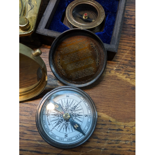 494 - Scientific instruments to include a compass, a miniature sextant, and an astronomical quadrant and c... 