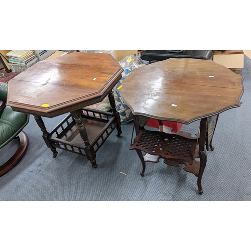 518 - Two late 19th/early 20th century mahogany octagonal topped two tier tables, one having four drop-dow... 