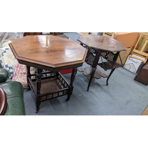 518 - Two late 19th/early 20th century mahogany octagonal topped two tier tables, one having four drop-dow... 