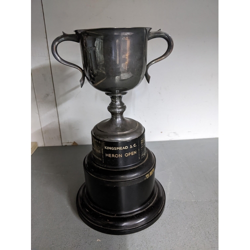 413 - A silver sailing trophy for the Kingsmead Sailing Club Heron Open, the twin handled cup mounted on a... 