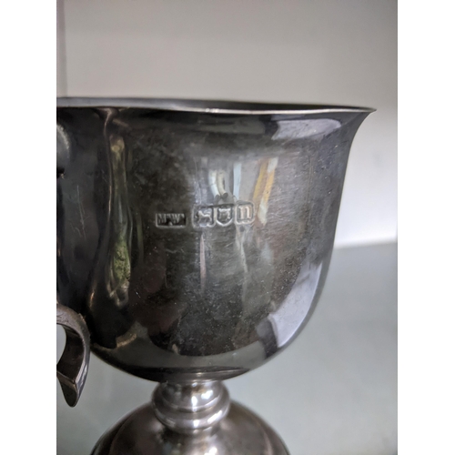 413 - A silver sailing trophy for the Kingsmead Sailing Club Heron Open, the twin handled cup mounted on a... 