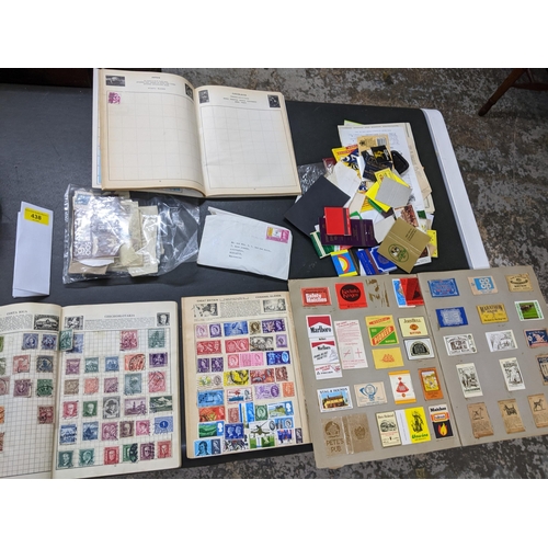 438 - Stamps and other collectables to include three stamp albums with stamps around the world including C... 