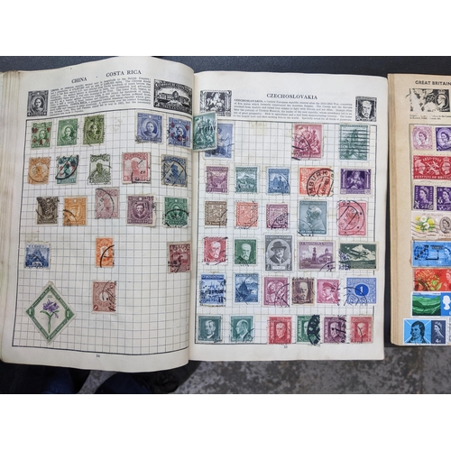 438 - Stamps and other collectables to include three stamp albums with stamps around the world including C... 