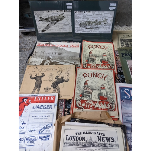 521 - A mixed lot of ephemera to include Punch, The Tatler, The illustrated London News, The Sphere magazi... 