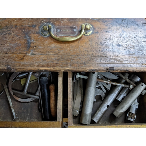 298 - An oak engineer's tool chest with two short and three long drawers with sliding front, containing va... 