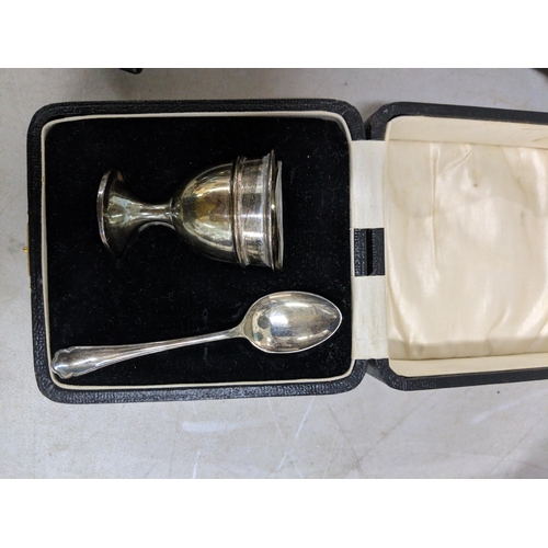 506 - A silver Christening set to include a teaspoon, egg cup and napkin holder, hallmarked Sheffield 1922... 