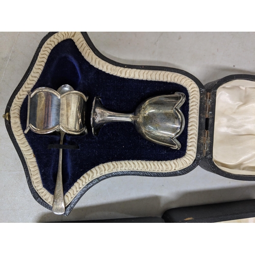 506 - A silver Christening set to include a teaspoon, egg cup and napkin holder, hallmarked Sheffield 1922... 