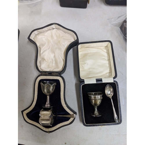 506 - A silver Christening set to include a teaspoon, egg cup and napkin holder, hallmarked Sheffield 1922... 