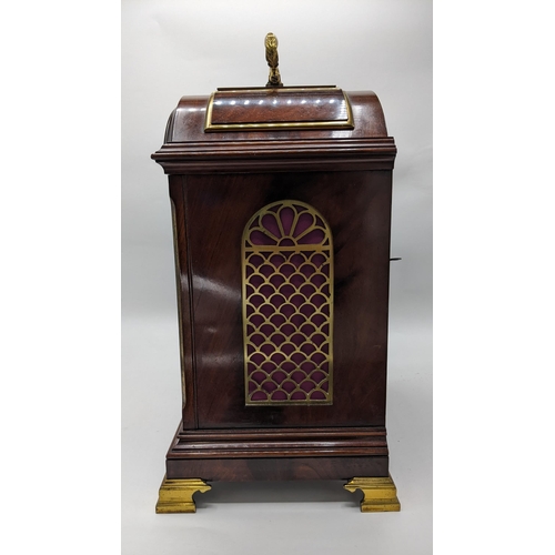 109 - A circa 1900 Payne & Co mahogany 8 day bracket clock, the arched top case having pierced grille side... 