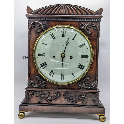 110 - A William IV mahogany 8 day bracket clock, the case having pierced grille sides, floral swag mouldin... 