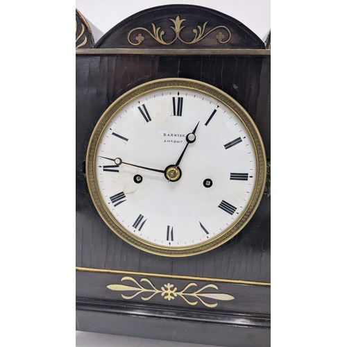 113 - A Regency 8 day bracket clock by Barwise, London, in an ebonized case with brass inlaid and pull rep... 