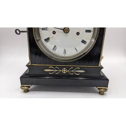 113 - A Regency 8 day bracket clock by Barwise, London, in an ebonized case with brass inlaid and pull rep... 