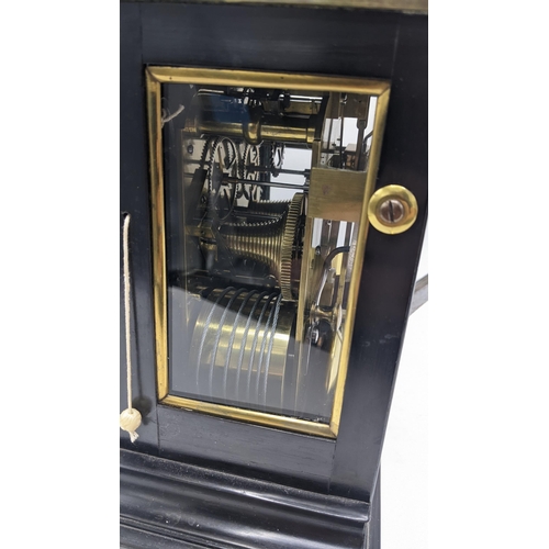 113 - A Regency 8 day bracket clock by Barwise, London, in an ebonized case with brass inlaid and pull rep... 