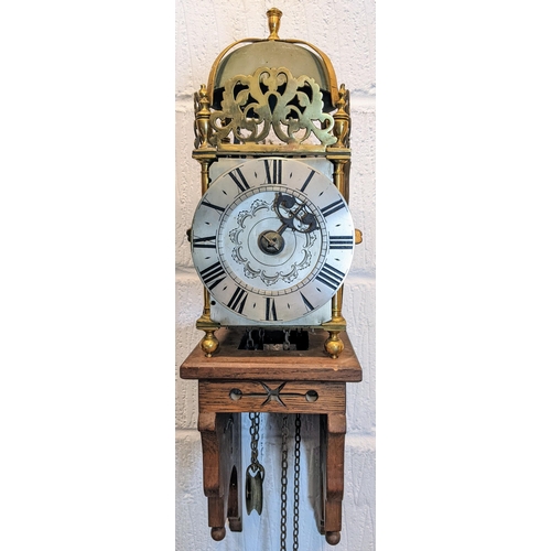 115 - An 18th century and later lantern clock, the four post case with 6