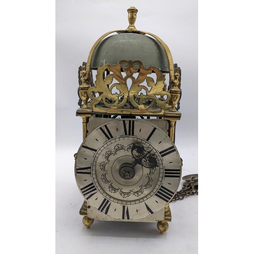 115 - An 18th century and later lantern clock, the four post case with 6