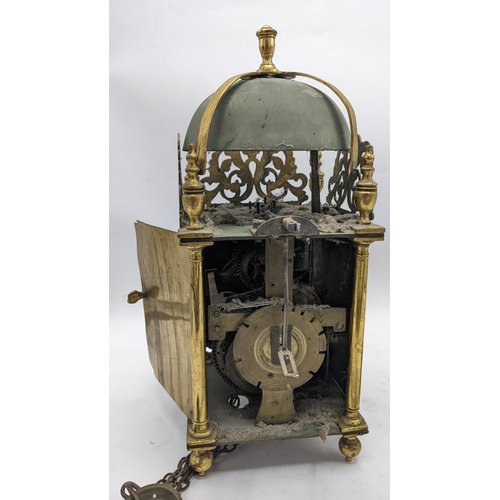 115 - An 18th century and later lantern clock, the four post case with 6