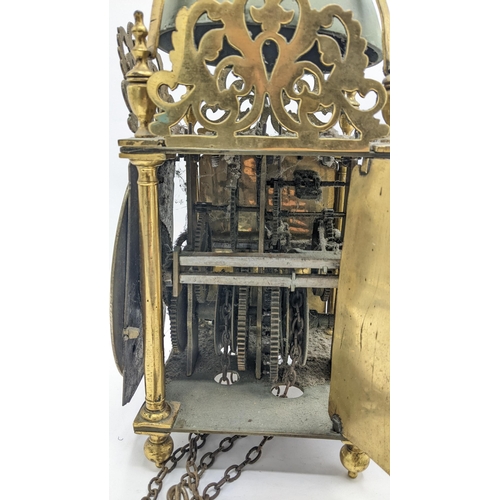 115 - An 18th century and later lantern clock, the four post case with 6