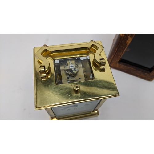 55 - An early 20th century brass cased repeater carriage clock, the white enamel dial having Roman numera... 