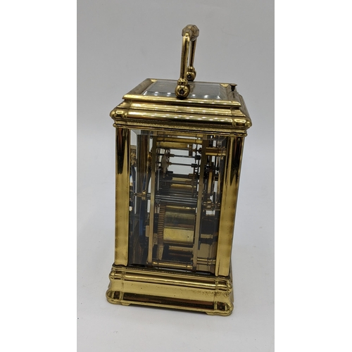 56 - A late 19th Century repeating carriage clock, by Henri Jacot, Paris, having a white enamel roman dia... 
