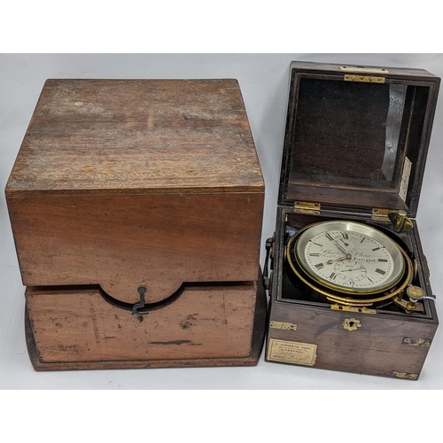 61 - A Charles Piers two day marine chronometer in a fitted rosewood case, the 4 inch silvered dial signe... 