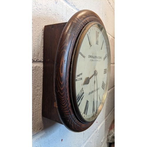 63 - A late 19th century 12 inch dial clock in an oak case, the dial inscribed 'Swinden & Sons 27.28 & 29... 