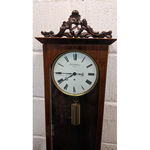 64 - A 19th century Biedermeier Vienna regulator wall clock, the rosewood case having boxwood inlaid and ... 