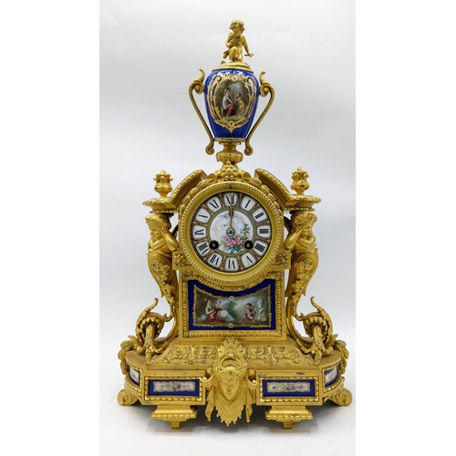 66 - A 19th century French gilt bronze mantle clock, the case having Sevres style porcelain panels, urn f... 