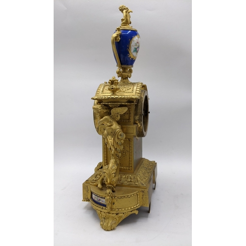 66 - A 19th century French gilt bronze mantle clock, the case having Sevres style porcelain panels, urn f... 