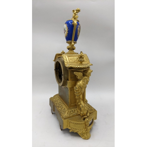 66 - A 19th century French gilt bronze mantle clock, the case having Sevres style porcelain panels, urn f... 