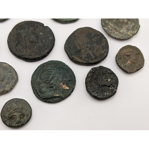 143 - Ancient Greece A group of eleven bronze coins to include Thrace Athena advancing example, one depict... 