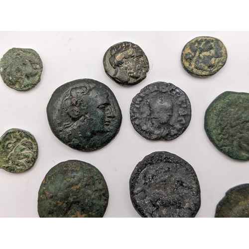 145 - Ancient Greece - A group of twelve bronze coins to include, Apollo Tripod, Thrace Apollonia Pontika ... 