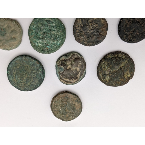 146 - Ancient Greece - A group of eleven mixed coins to include helmeted head of Athena in crested Corinth... 