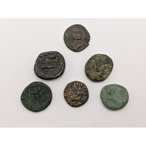 148 - Ancient Greece - A group of six mixed coins to include Macedonian bronze, Head of Herakles in lion s... 