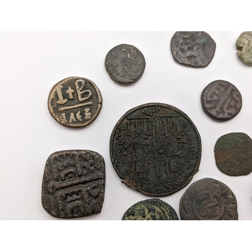 149 - A mixed collection of bronze and copper coins to include Rome / Byzantine examples, later Indian Sul... 