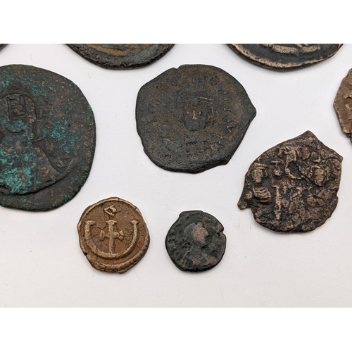 151 - Byzantine Empire - Mixed copper and bronze coinage to include NIKO 40 Nummi, Follis, Half Follis and... 