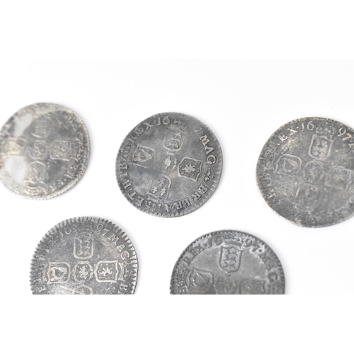 193 - Wreck coins - reputedly H.M.S Association - William III (1689-1702), Sixpence, a group of five sixpe... 