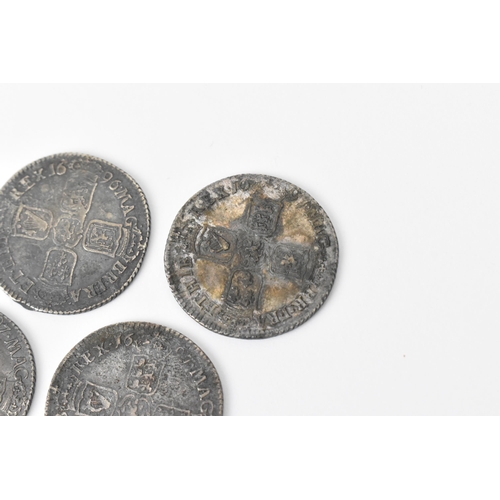 194 - Wreck coins - reputedly H.M.S Association - William III (1689-1702), Shillings, a group of five 1696... 