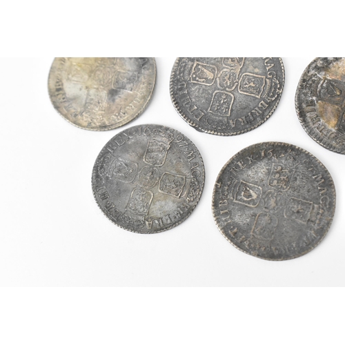 194 - Wreck coins - reputedly H.M.S Association - William III (1689-1702), Shillings, a group of five 1696... 