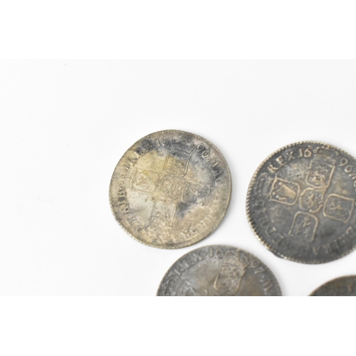 194 - Wreck coins - reputedly H.M.S Association - William III (1689-1702), Shillings, a group of five 1696... 