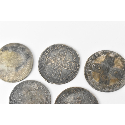 194 - Wreck coins - reputedly H.M.S Association - William III (1689-1702), Shillings, a group of five 1696... 