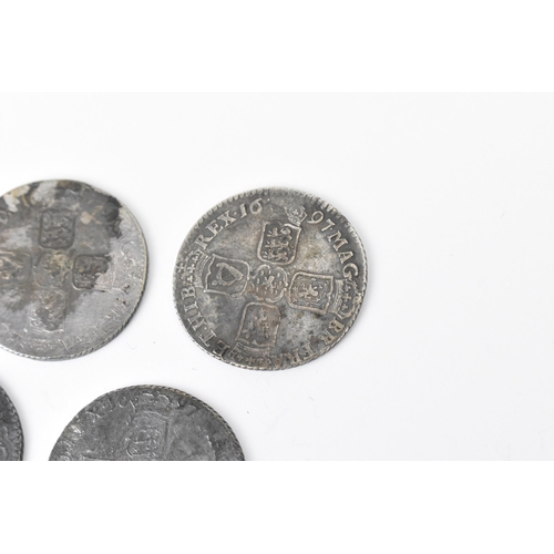 195 - Wreck coins - reputedly H.M.S Association - William III (1689-1702), Shillings, a group of five date... 