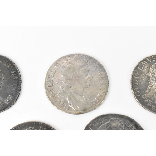 195 - Wreck coins - reputedly H.M.S Association - William III (1689-1702), Shillings, a group of five date... 