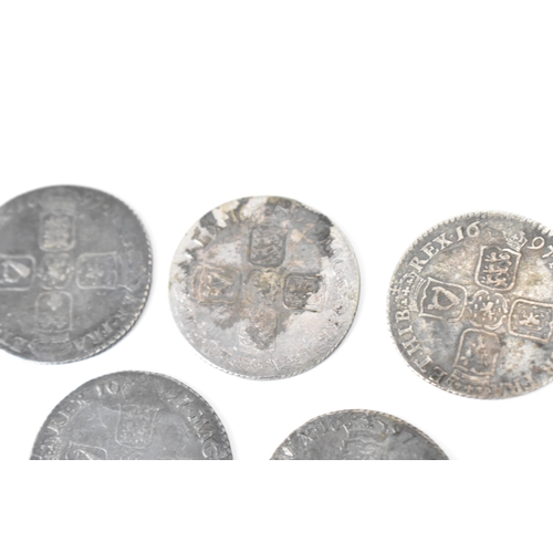 195 - Wreck coins - reputedly H.M.S Association - William III (1689-1702), Shillings, a group of five date... 